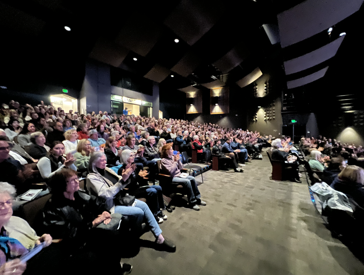 A sold out crowd watches Joseph Alexanders presentation. Photo taken by Molly Myers on April 14.